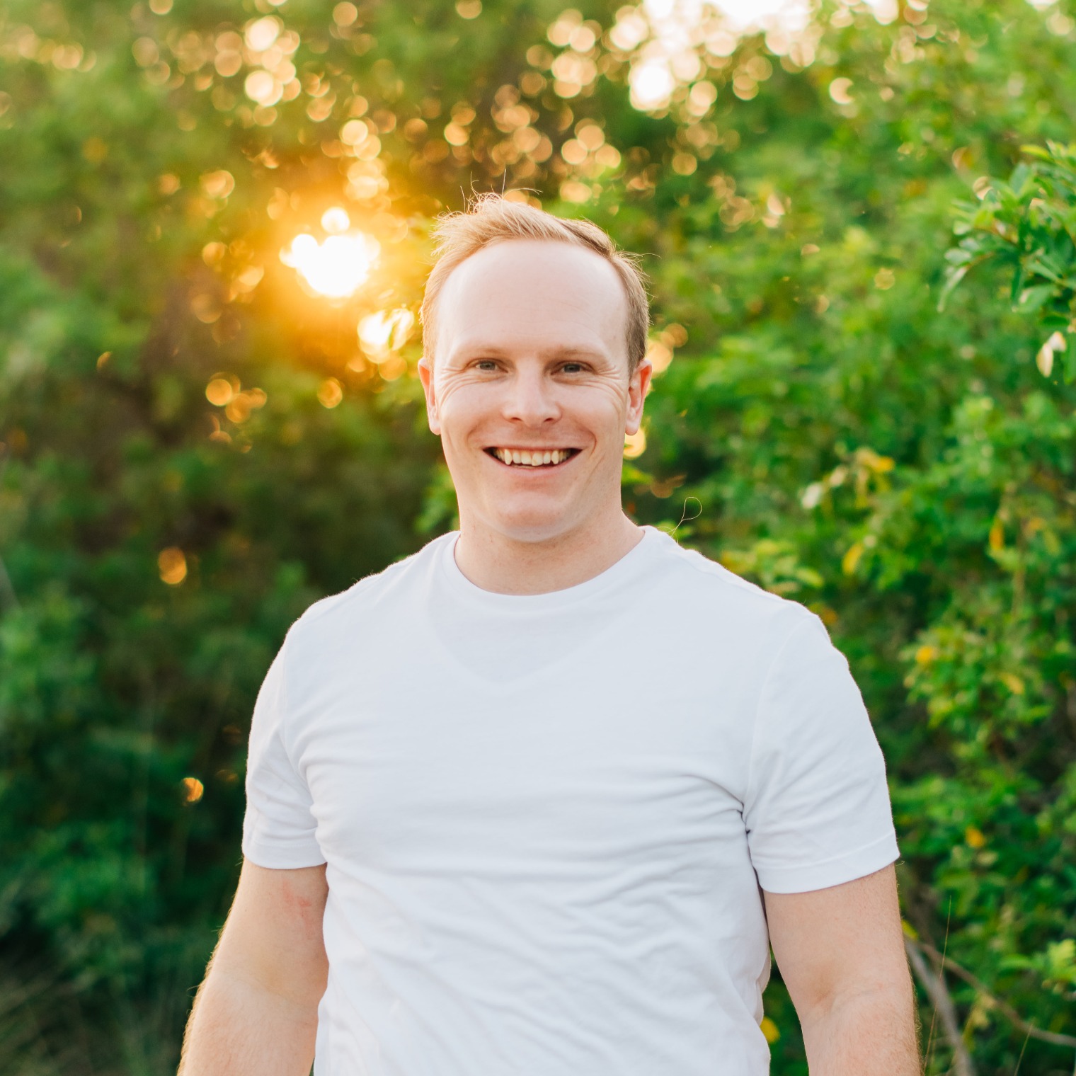 Andrew Thomas outdoors in the evening sun